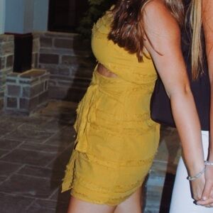 Yellow mini dress with cut out